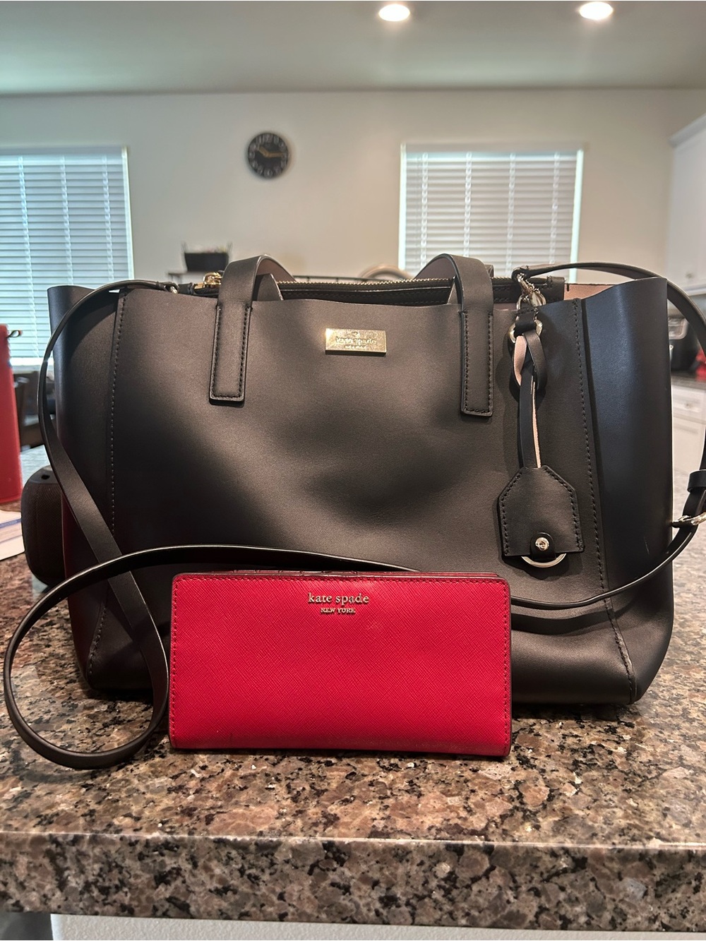 Kate Spade Black All Leather Tote with Red Wallet.